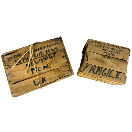 89 - Two world travelled boxes from HMS Newfoundland containing a quantity Japanese Geisha girls ghost po... 