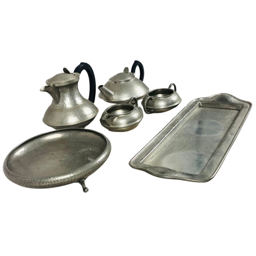 114 - Collection of Argent hammered pewter ware Tea and Coffee service.