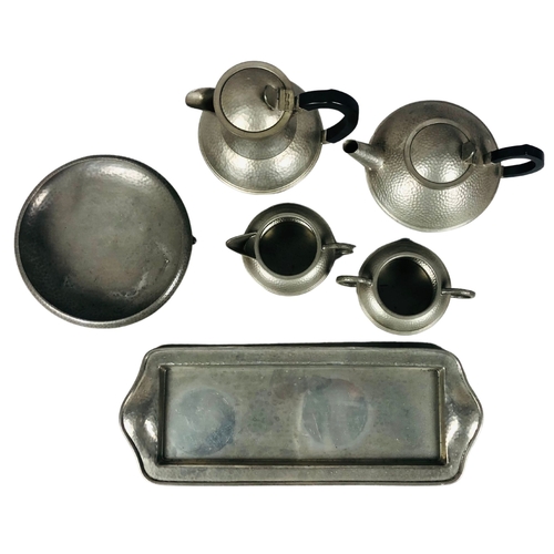 114 - Collection of Argent hammered pewter ware Tea and Coffee service.