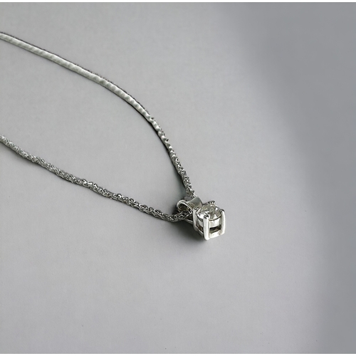 279 - A 9ct white gold & solitaire diamond pendant on 9ct gold chain.