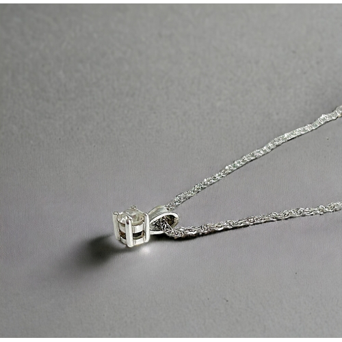 279 - A 9ct white gold & solitaire diamond pendant on 9ct gold chain.