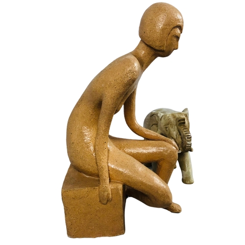 137 - Modernist clay sculpture of a Woman & a stone Elephant