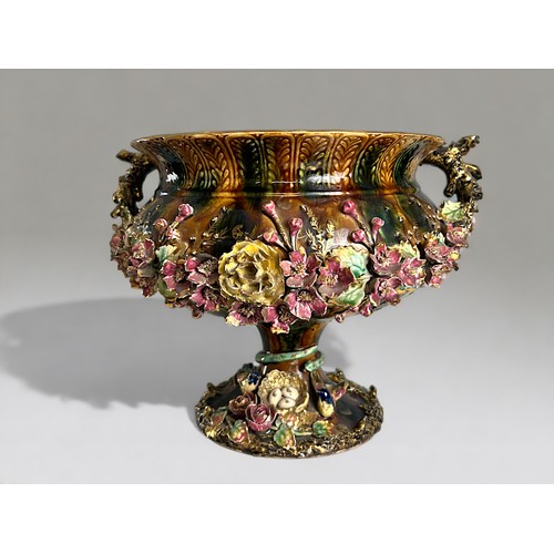 507 - A large French Barbotine Palissy style Jardiniere.Encrusted with flowers and entwined Snake to stem ... 