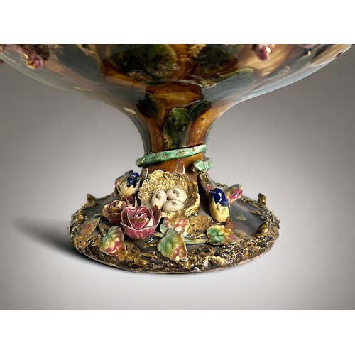 507 - A large French Barbotine Palissy style Jardiniere.Encrusted with flowers and entwined Snake to stem ... 