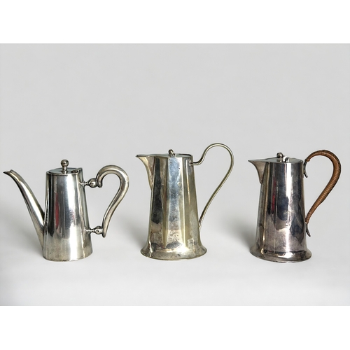 742 - Three 19th century silver plate water jugs.In Christopher dresser style designs. Tallest - 18cm... 