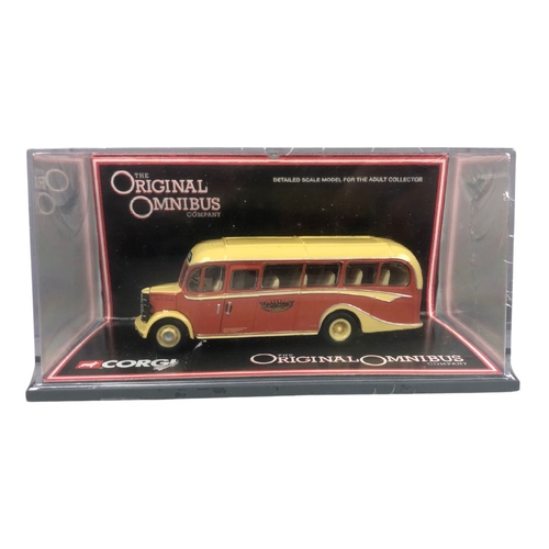 353 - 6 boxed Corgi Buses.  MIB