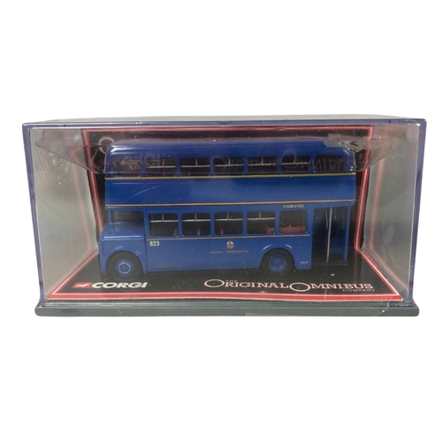 353 - 6 boxed Corgi Buses.  MIB