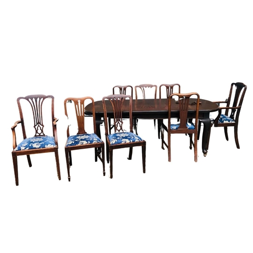 361 - A mahogany wind out dining table with one leaf insert. Complete with winder. Six Chairs and Two Carv... 