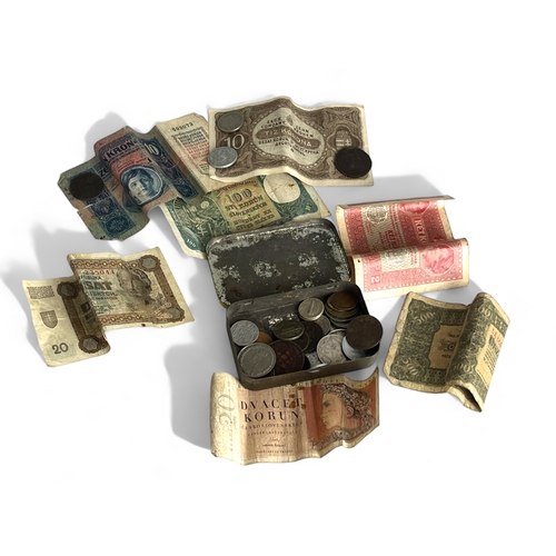 243 - A collection of Eastern European bank notes, together with a tin of mainly European coins, 19th &... 