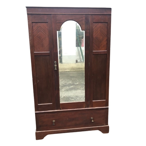 260 - Mahogany Wardrobe with central bevelled dressing mirror and drawer beneath. Approx 198cm x 119 x 45