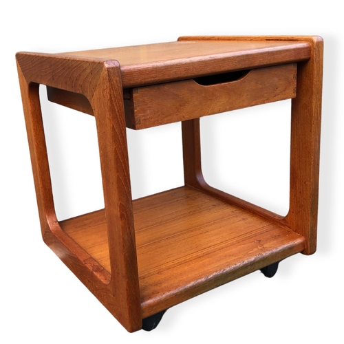 329 - Salin Nyborg Mid century modern Teak Bedside table. With single drawer on wheels.