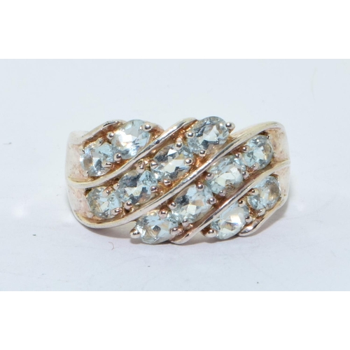 216 - 925 silver double row sweep ring set with Aquamarine colour stones size M