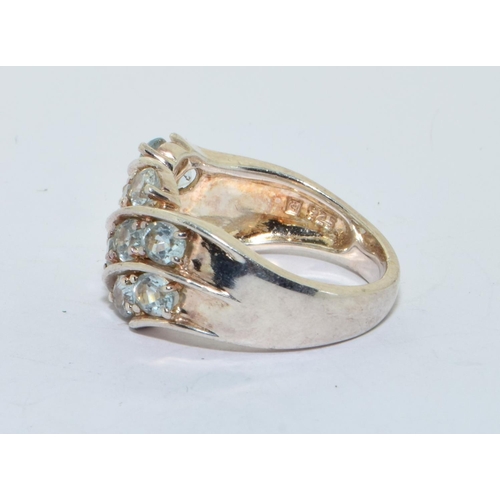 216 - 925 silver double row sweep ring set with Aquamarine colour stones size M