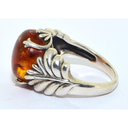 217 - 925 silver vintage Amber single stone ring with leaf pattern to the side size R