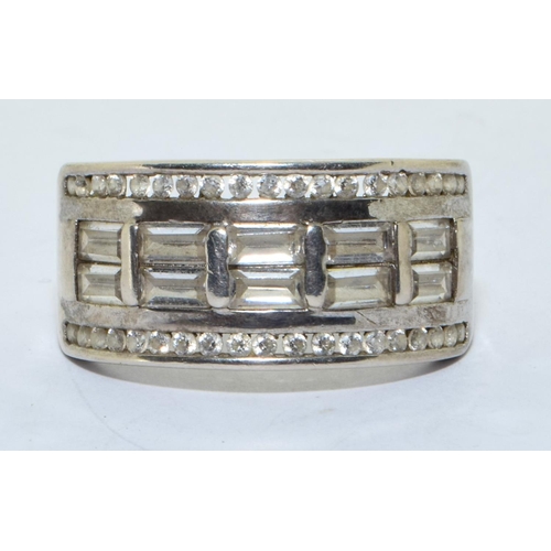 218 - 925 silver band set with baguette centre stones size S  