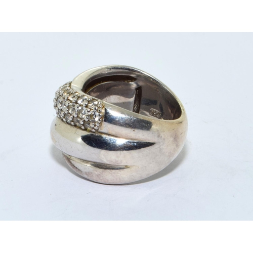 219 - 925 silver double sweep with clear stone pattern statmente ring size O