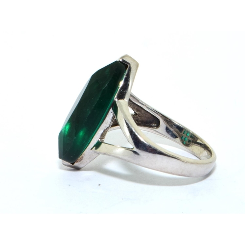 222 - 925 silver Designer ring as an off set marquise shape emerald colour ring size N