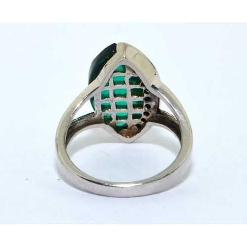 222 - 925 silver Designer ring as an off set marquise shape emerald colour ring size N