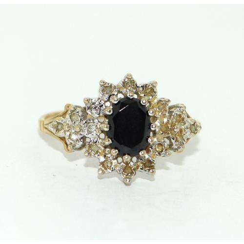 228 - 9ct gold ladies Diamond and Sapphire cluster ring Hall marked in ring as diamond size P