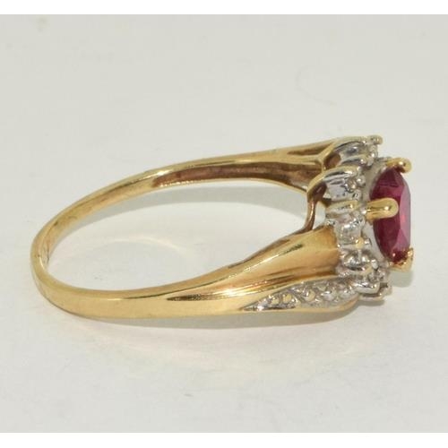 237 - 9ct gold ladies Ruby Heart ring set with Diamonds size R