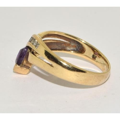 239 - 9ct gold Diamond and Amethyst ladies twist ring 3.5g size N