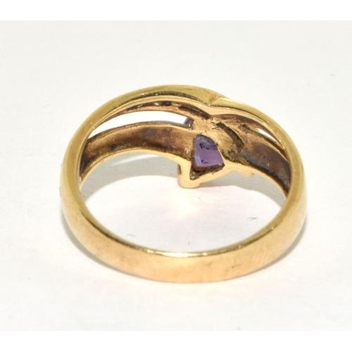 239 - 9ct gold Diamond and Amethyst ladies twist ring 3.5g size N