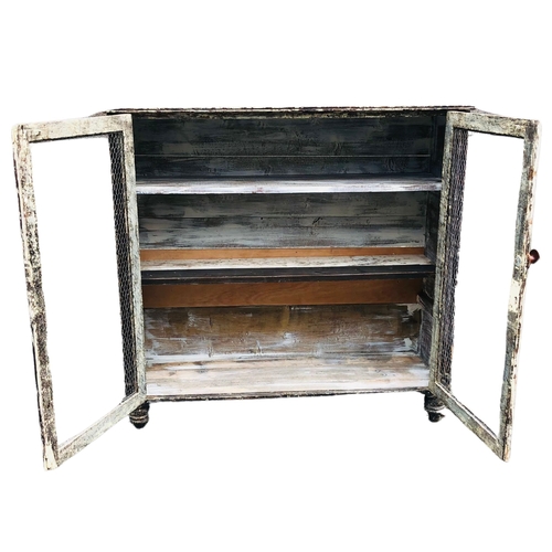 2 - Distressed shabby chic painted bookcase with wire to the doors. Approx Width 110cm x depth 37cm x he... 