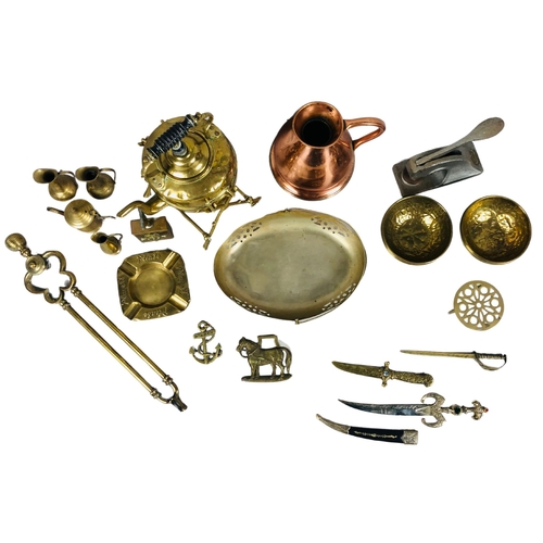 47 - Collection of brass items to include Indian Finger Bowls, fireside tongs, a kettle over a burner etc... 