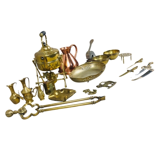 47 - Collection of brass items to include Indian Finger Bowls, fireside tongs, a kettle over a burner etc... 