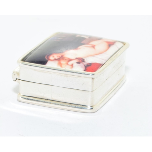 248 - A stamped sterling, silver pill box with a nude enamel panel to the lid