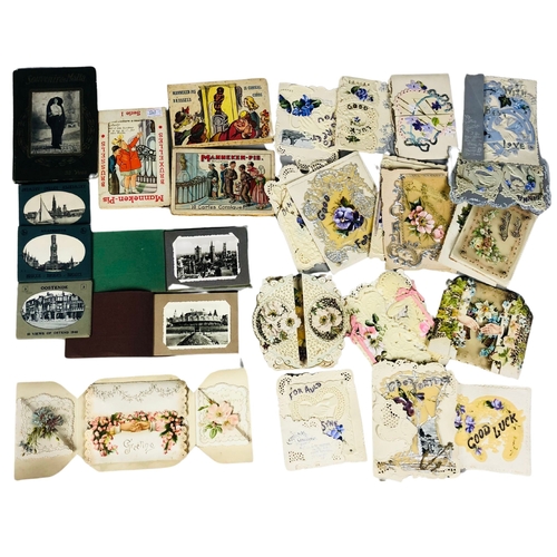 87 - Collection of Victorian and slightly later greeting cards together with souvenir postcard books etc