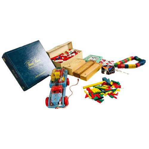 93 - Boxed Trivial Pursuit game and various wooden toys to include a nice quantity of vintage lego and a ... 