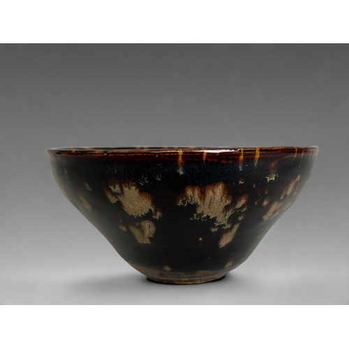 66 - A Chinese Jizhou type glazed bowl.'Tortoiseshell' design.