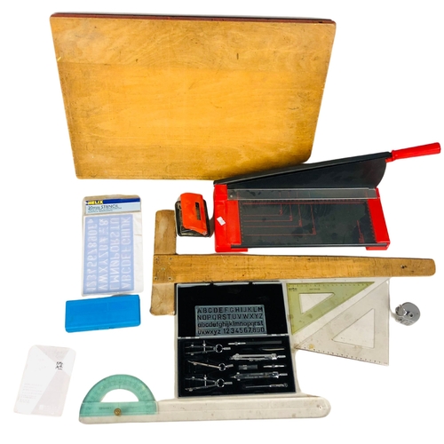 111 - Collection of items to include paper guillotine, stencils etc.