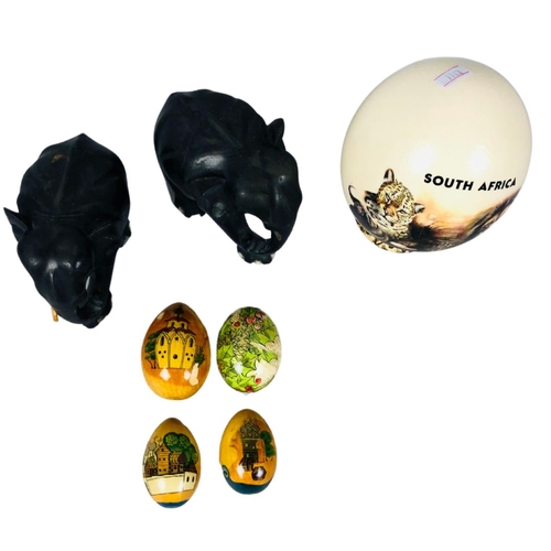 132 - Painted and signed ostrich egg together with 2 vintage carved wooden elephants and a collection of 4... 