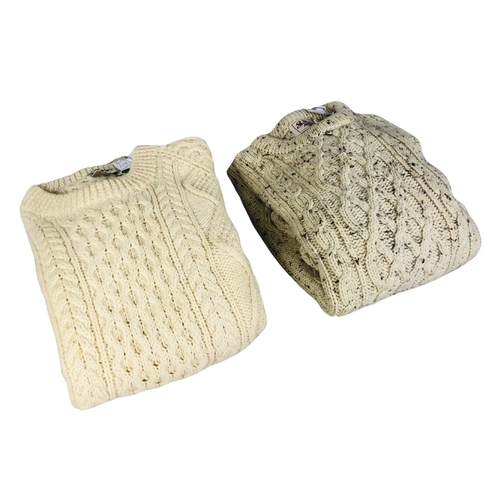 147 - Two wool Cornish style fishermans sweaters. 48