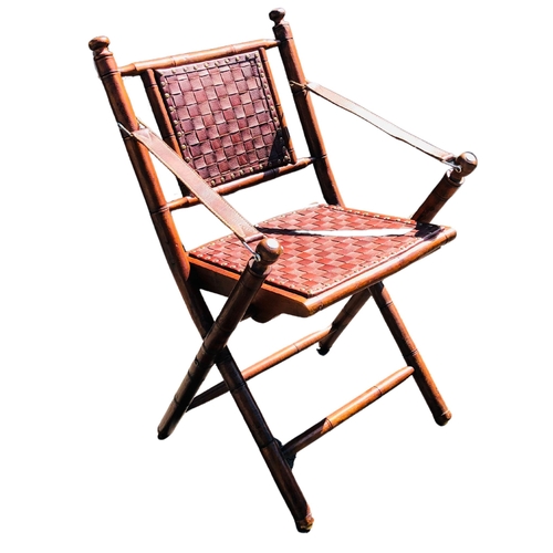 4 - Indonesian Mangowood and Leather fold up chair.