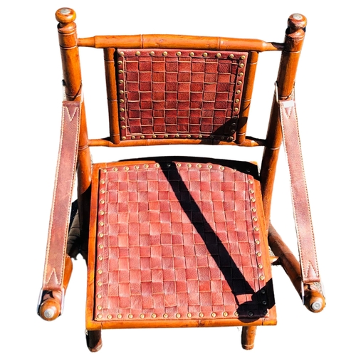 4 - Indonesian Mangowood and Leather fold up chair.