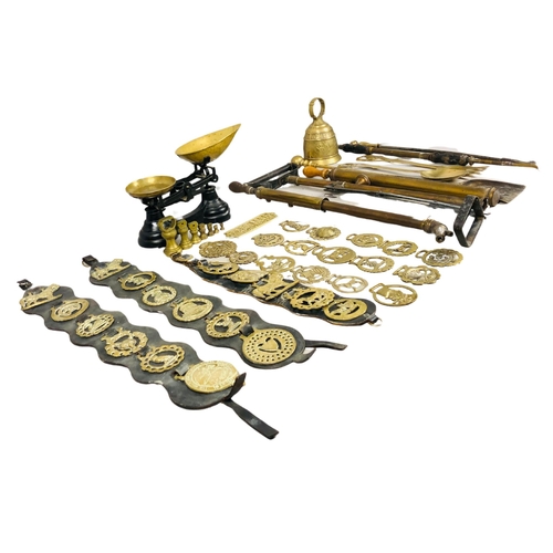 33 - Collection of horse brasses antique and later, scales and other items from a pub clearance