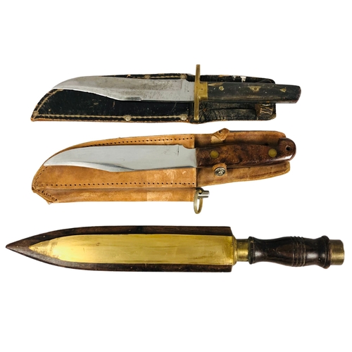 56 - 3 hunting style Knives in scabbards