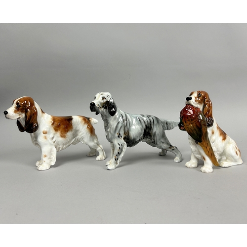 131 - A Scarce Royal Doulton Spaniel (H.N1028) figurine. Together with Cocker Spaniel (HN1036) and English... 