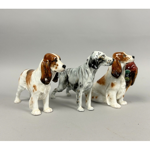 131 - A Scarce Royal Doulton Spaniel (H.N1028) figurine. Together with Cocker Spaniel (HN1036) and English... 