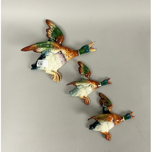 132 - A set of three Beswick flying ducks. Mallards.