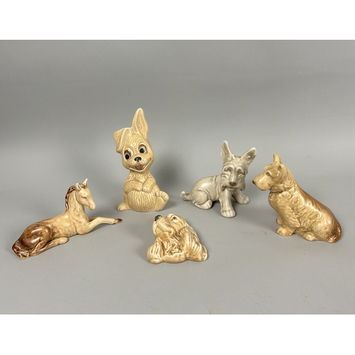 137 - A collection of five Sylvac pottery animals. Including dogs, Bunny and foal.