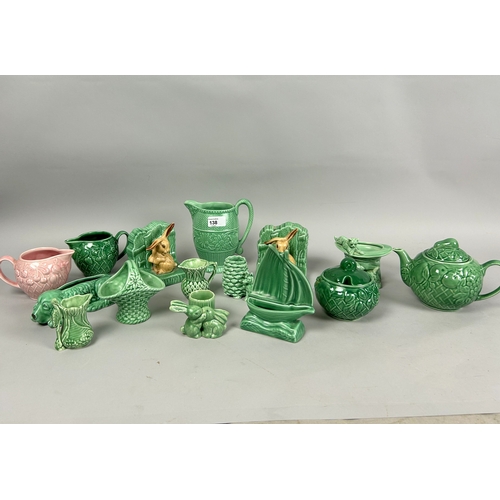 138 - A large collection of Sylvac pottery. Including Bunny bookends, teaset, Jugs and more.