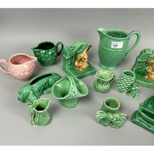 138 - A large collection of Sylvac pottery. Including Bunny bookends, teaset, Jugs and more.