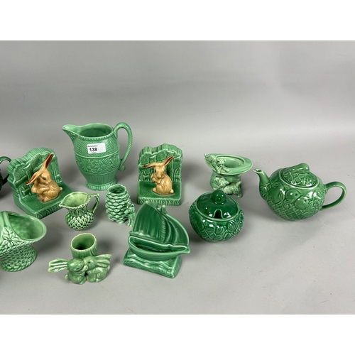 138 - A large collection of Sylvac pottery. Including Bunny bookends, teaset, Jugs and more.