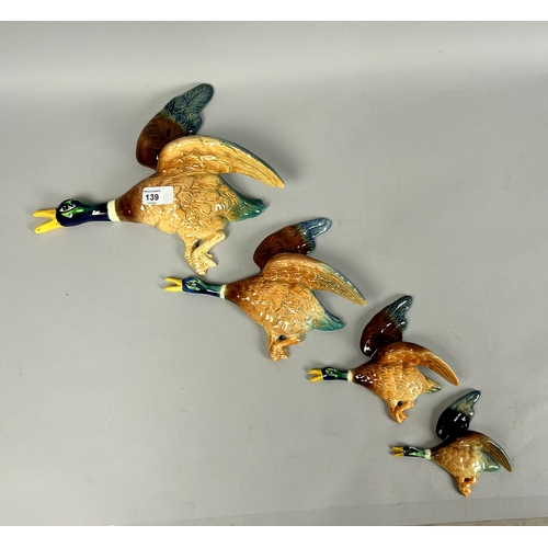 139 - A set of four Sylvac pottery flying wall ducks.