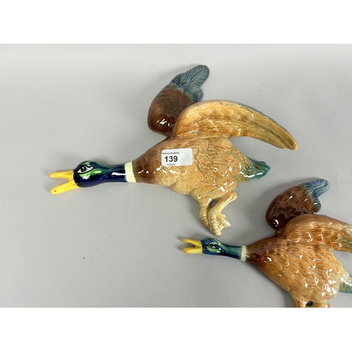 139 - A set of four Sylvac pottery flying wall ducks.