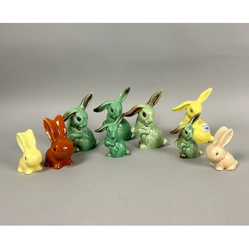 140 - A collection of nine Sylvac pottery bunny figures.